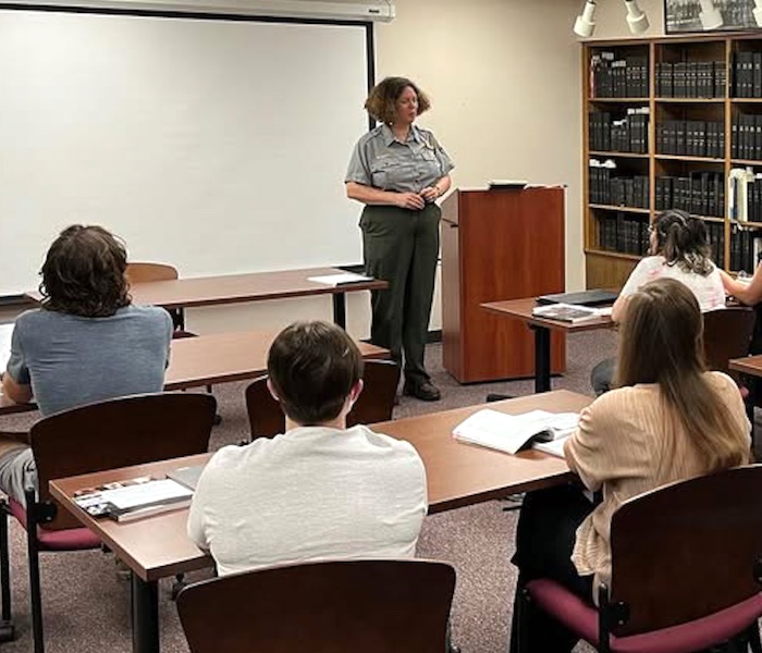 Students learning from park ranger