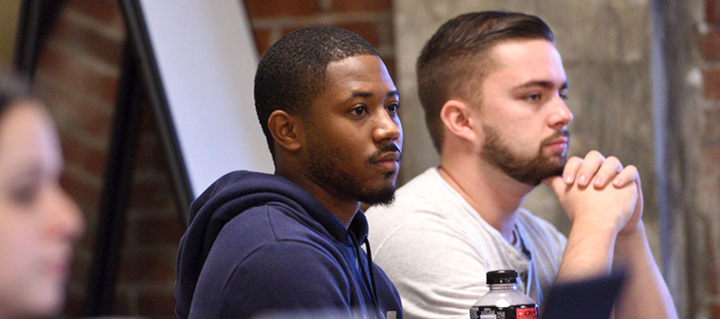 Two UA students in a classroom setting