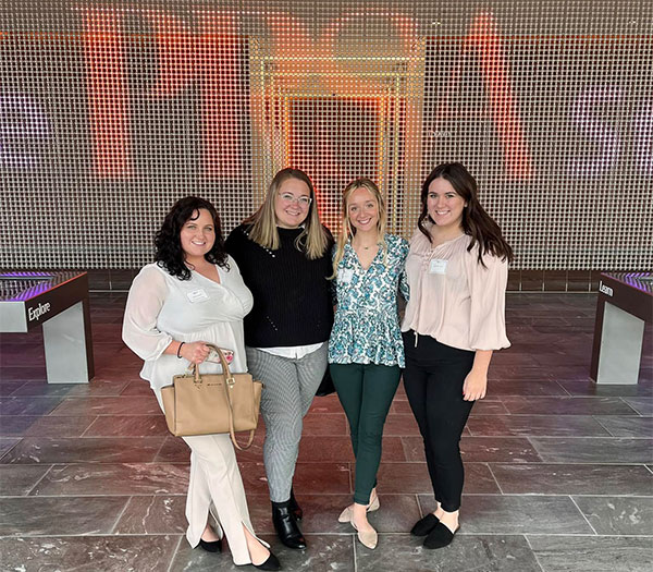 Student members pose together during a professional networking event.