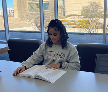 Student studying in law library