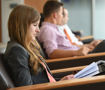 Student in second floor of atrium