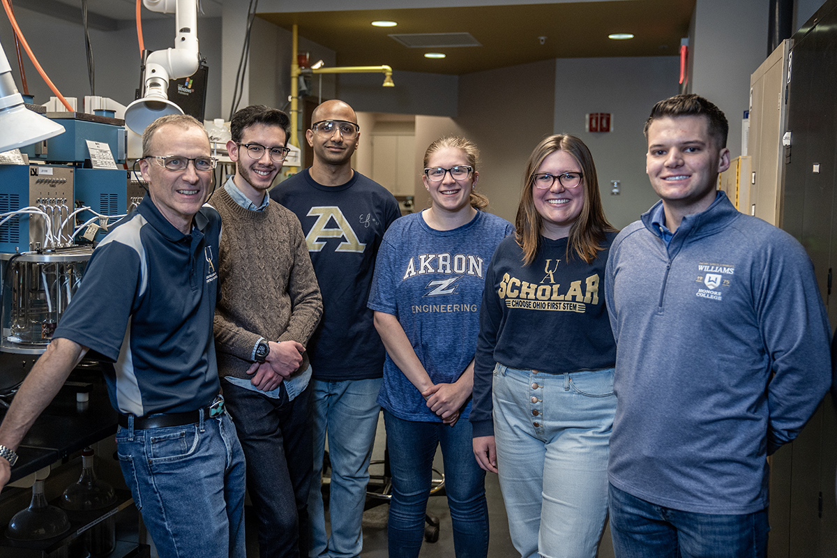 Student and faculty member in the tribology lab