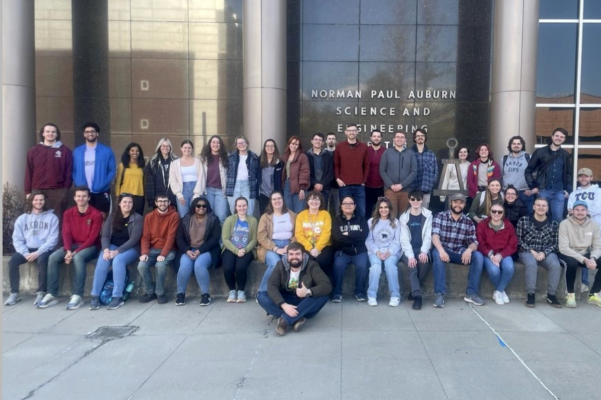 Ohio Kappa Tau Bates in front of the Auburn Science and Engineering Center.