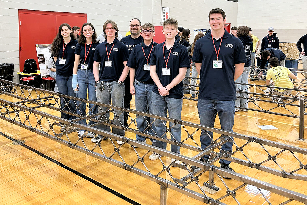 Audrey Francis, Amelia Roch, Ryan Zorko, Dr. David Roke, Zane Ketola, Evan Murphy and Braeden Bines pose with this year’s steel bridge.