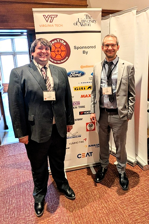 Brennan Crawford (left), a doctoral candidate, and Dr. James Eagan (right) at the CenTiRe meeting