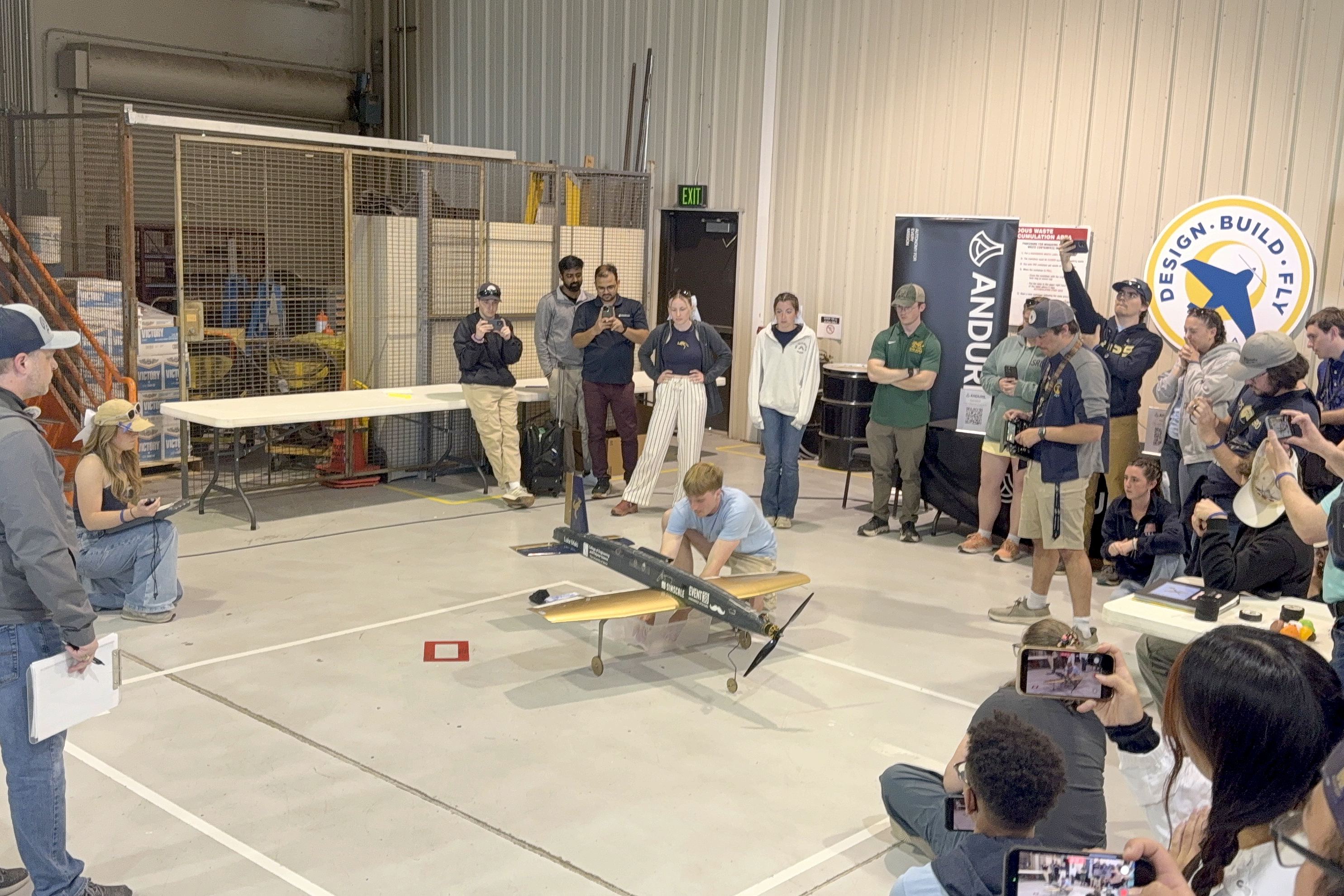 Aerospace systems engineering students Theodore Bickley and Noah Cohen complete the ground mission.