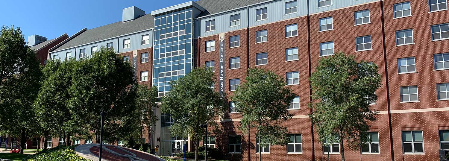 The brick exterior of the Williams Honors College residence hall on the University of Akron Campus